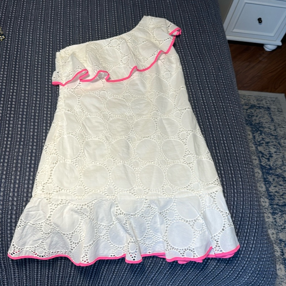 Sail to Sable one shoulder eyelet dress with pink trim